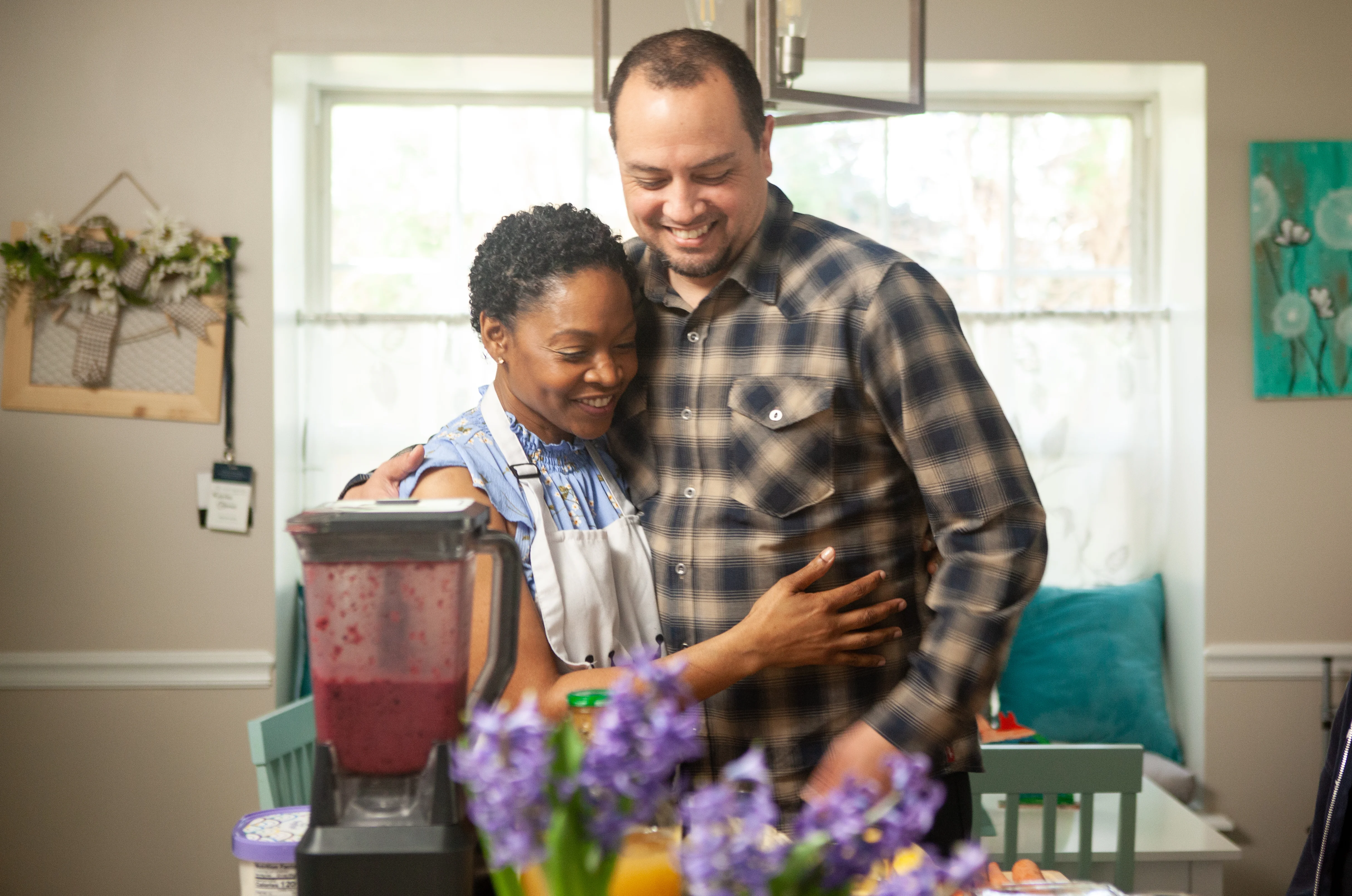 Kimberly in the kitchen with her family 
