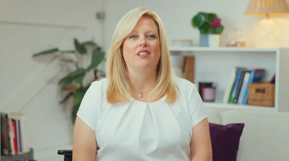 a woman sitting in a chair