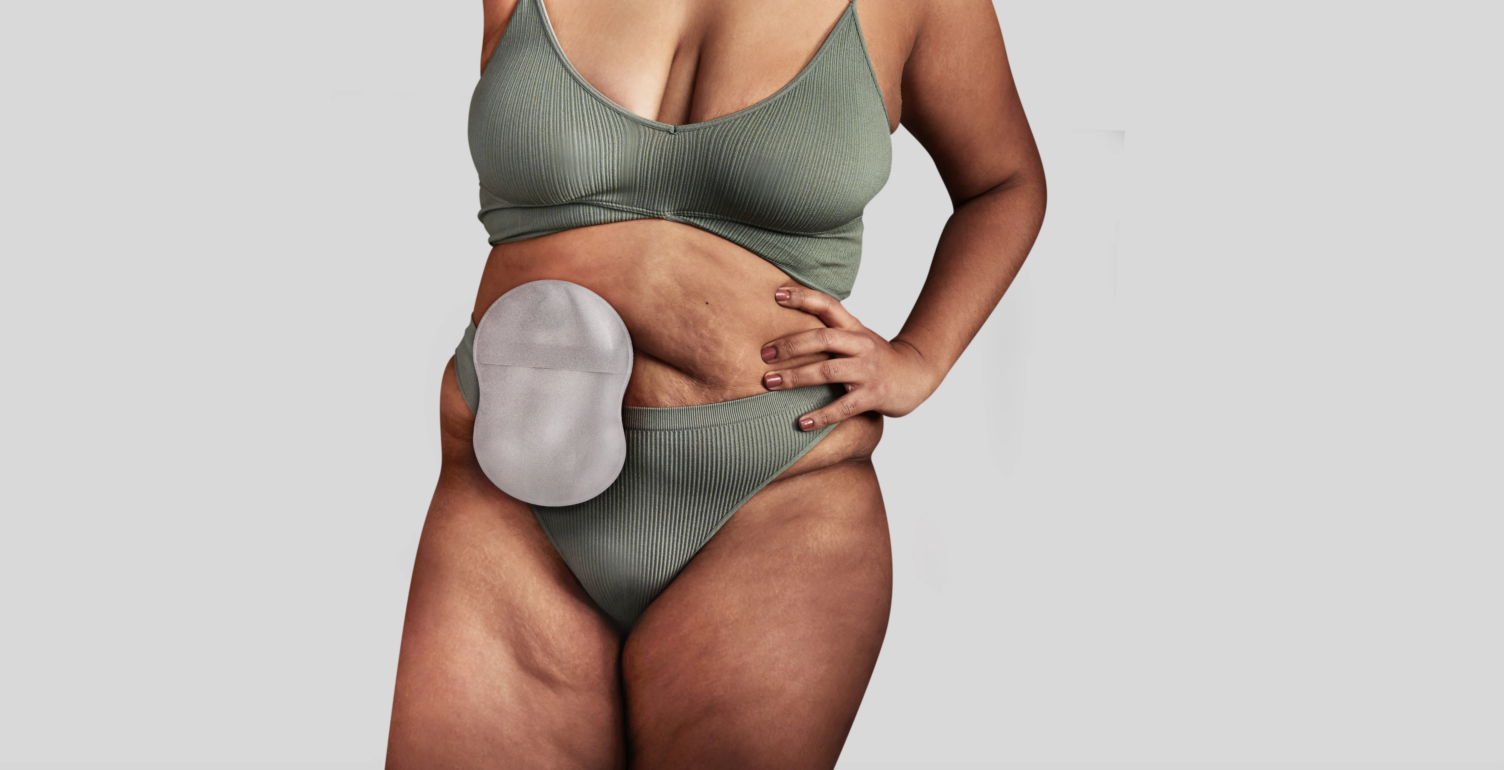 Woman wearing an ostomy Esteem Body™ pouch